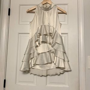 Gracia satin sleeveless shirt with ruffles